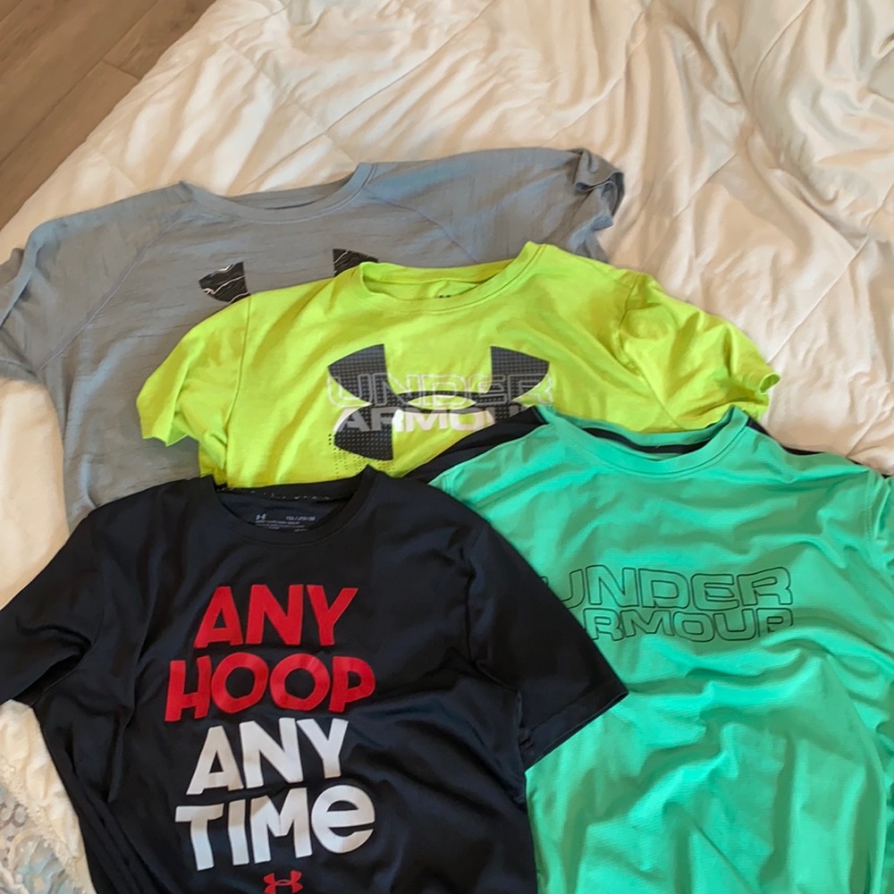 Four athletic shirts